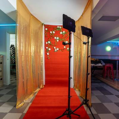 A setup for a photo booth rental service at an event.