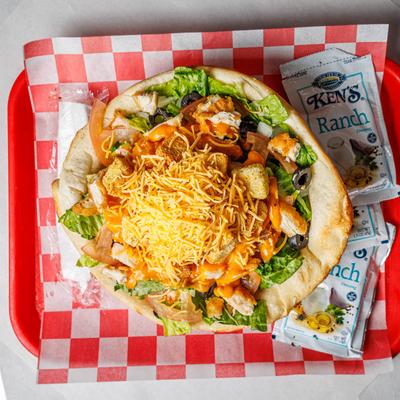 Crispy chicken bread bowl salad.