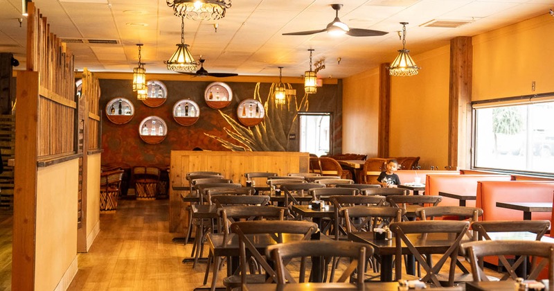 Interior, tables and chairs ready for guests