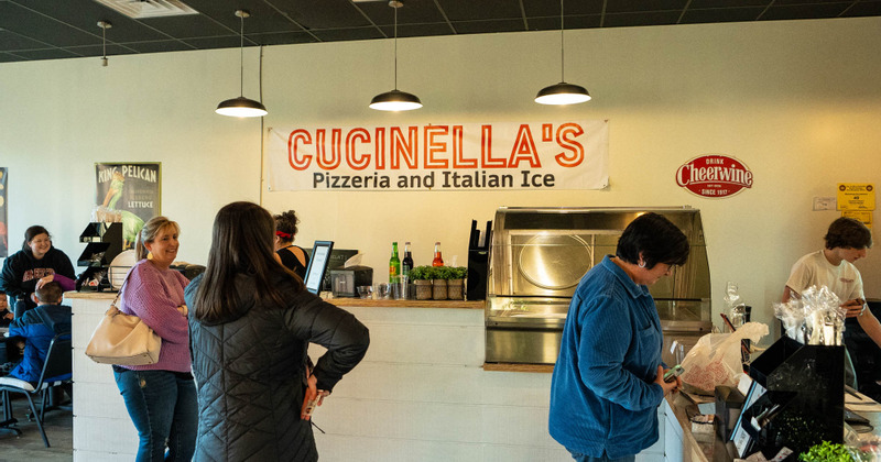 Restaurant interior, guests waiting for orders