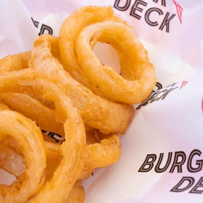 Close up of crispy onion rings.