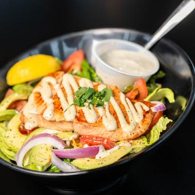 Salmon salad and dressing.