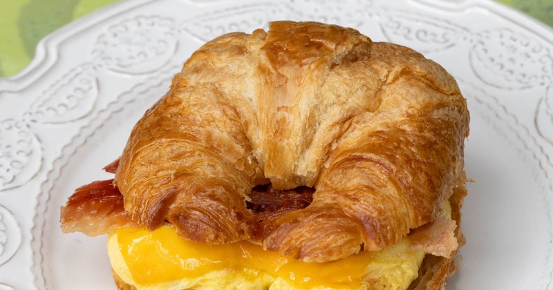 Scrambled egg sandwich on a baked butter croissant