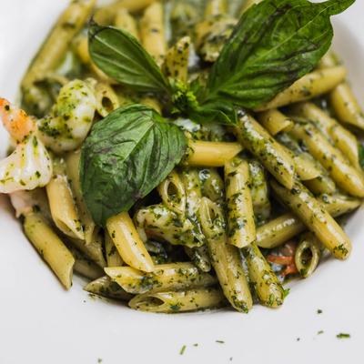 Penne Bosco E Mare with pesto sauce.