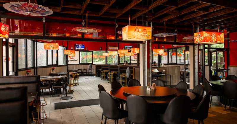 Modern and spacious interior dining area with traditional Chinese decoration