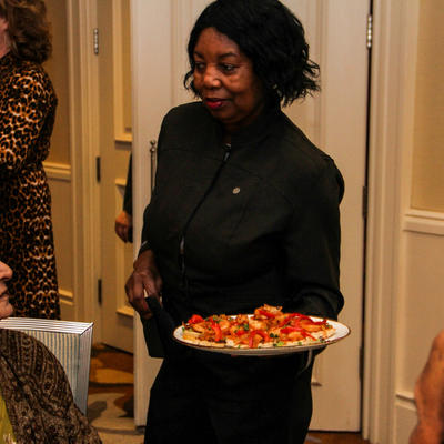 Waitress carrying a plate