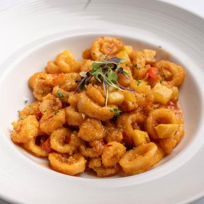 Thai Calamari with sweet chili sauce, plantain and red sweet piquillo peppers.