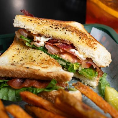 Garlic toast BLT sandwich and fries.