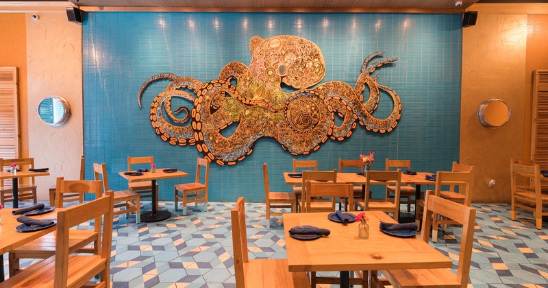 Interior, tables and chairs, big wall 3d sign