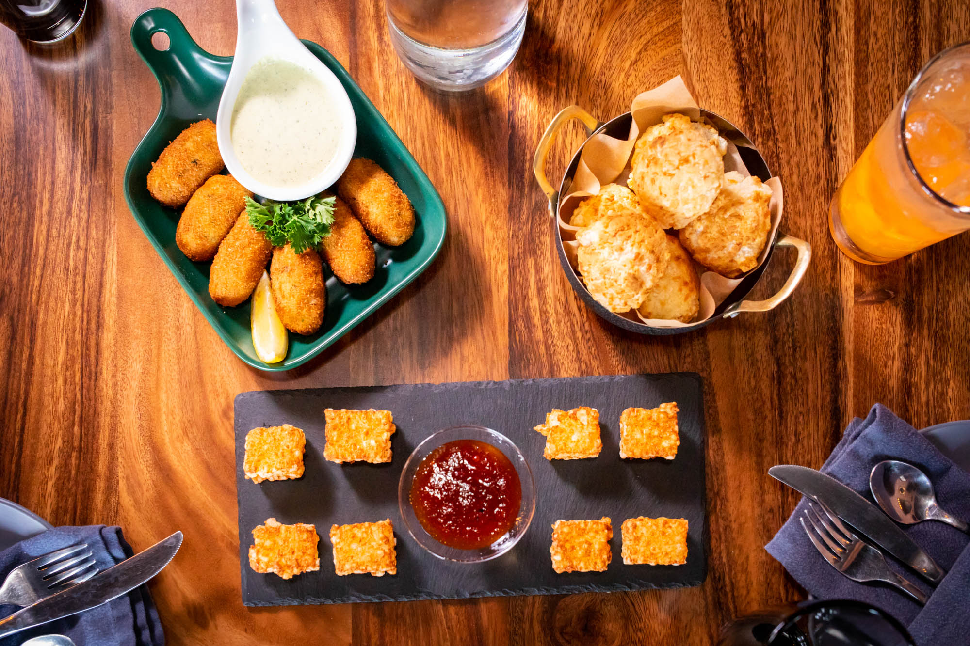 Multiple food plates, overhead view