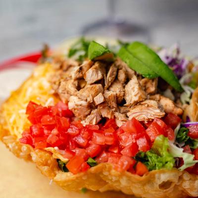 Chicken taco salad served, closeup