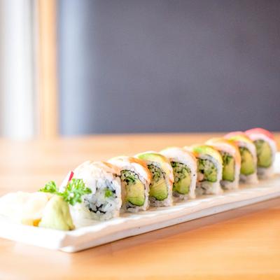 Rainbow Maki roll served with wasabi and pickled ginger.
