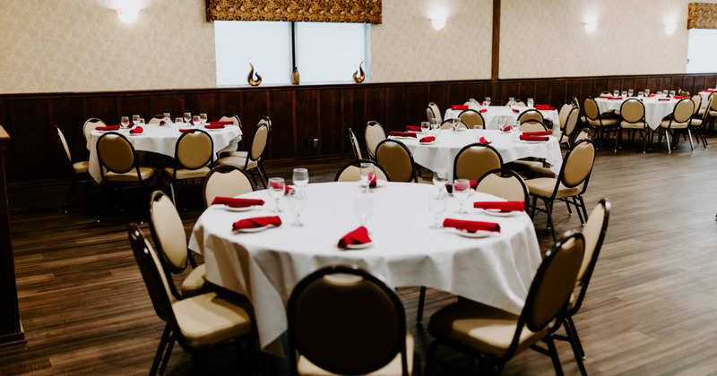 Interior, dining tables ready for guests