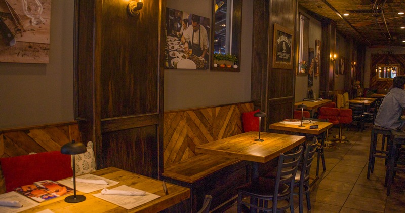 Interior, tables, chairs and benches in dining area