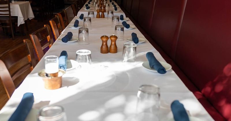 Interior, tables set for guests