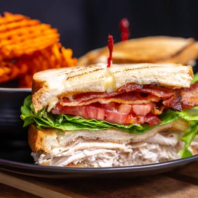 Classic Turkey club with sweet fries.