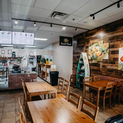Diner table, food counter behind.
