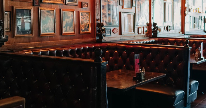 Interior, button tufted curved booth seating