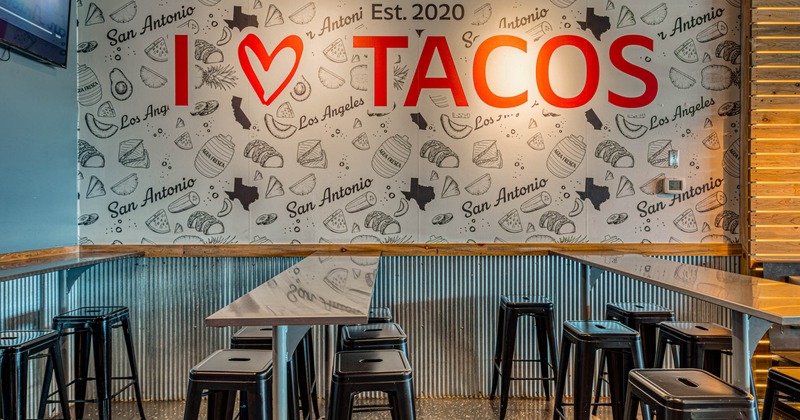 Inside, seating area with wall decoration