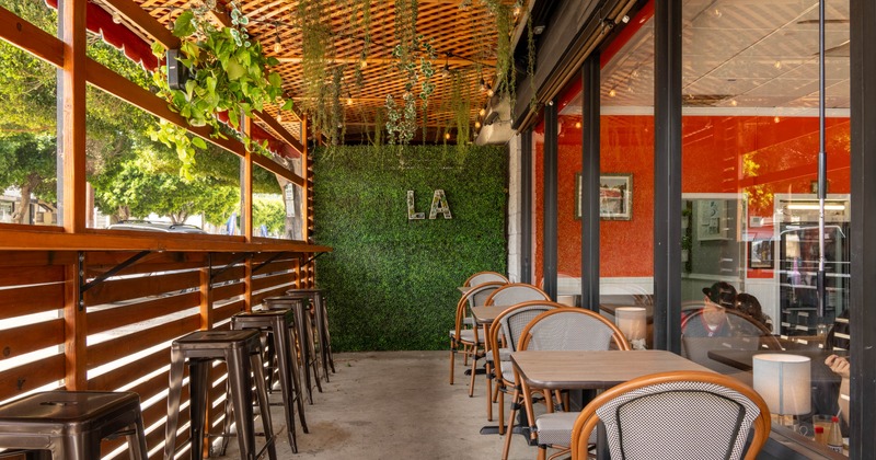 Outdoor patio with wooden and metal furniture