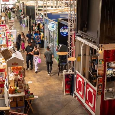 House of Vibes interior with various vendor booths.