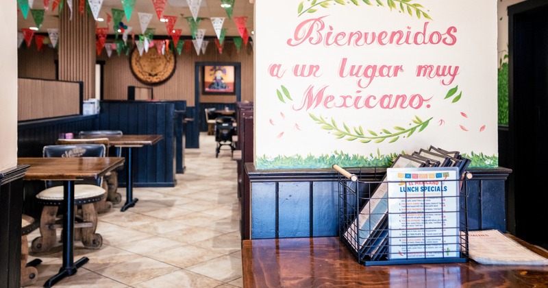 Welcome screen in front diner area, tables,chairs