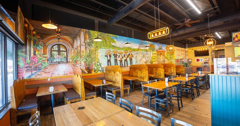 Restaurant interior, wooden booths, chairs and tables