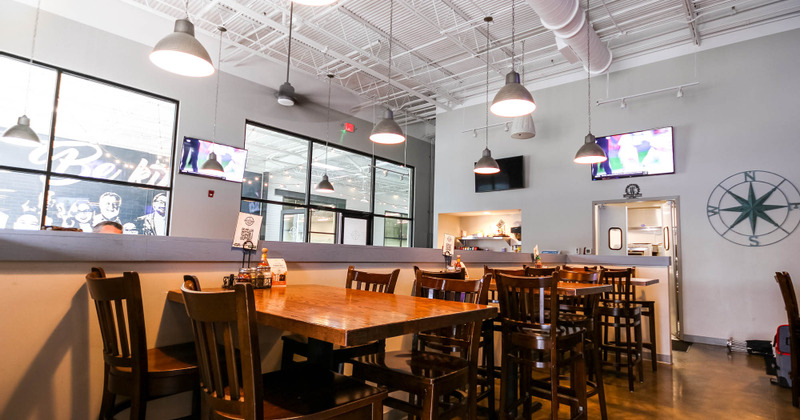 Tables for four set and ready for guests