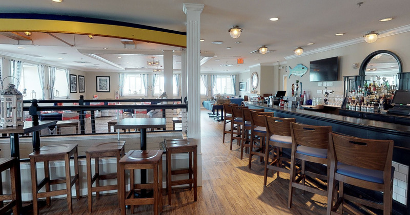 Interior, fireplace, table and two two-seater