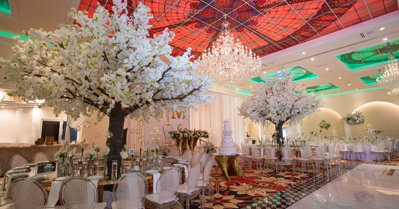 Grand banquet hall - blossom trees, crystal chandeliers, decorative ceiling, elegant dining setup