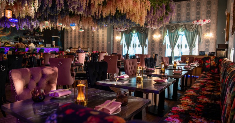 Seating area with tables and chairs waiting for the guests