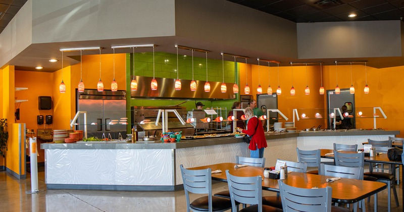 Interior, self serve food counter and dining tables