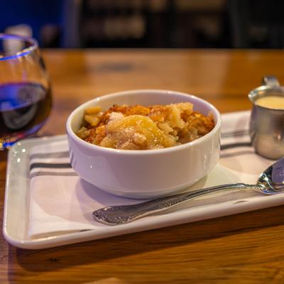 Mother Mary's Cobbler served with bourbon custard.