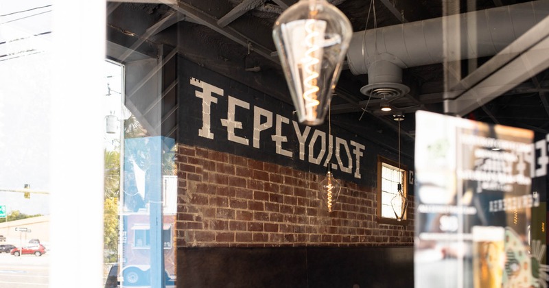 Restaurant sign on wall