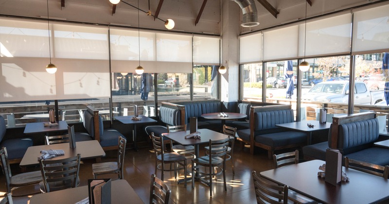 Interior, dining area, tables ready for guests
