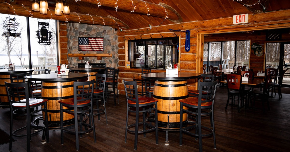 Seating area, tables made of barrels and bar stools