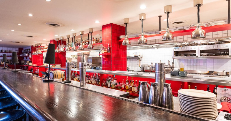 Restaurant interior, set dining tables ready to receive guests