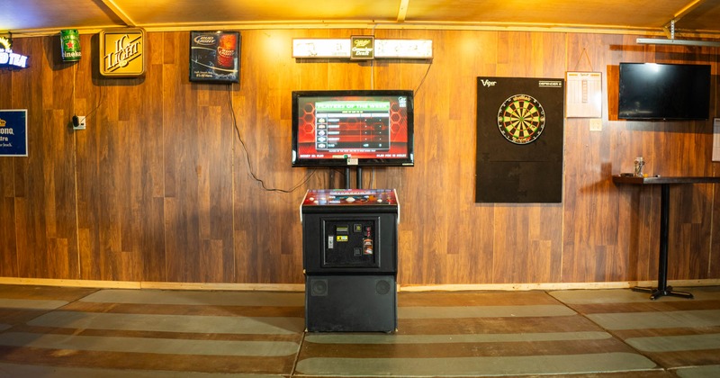 Interior, entertainment room, dart machine, video game console