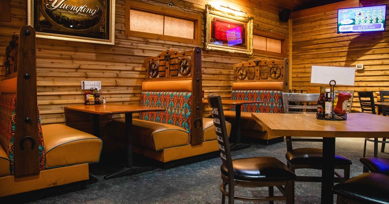 Interior, wooden , bench and tables ready for guests