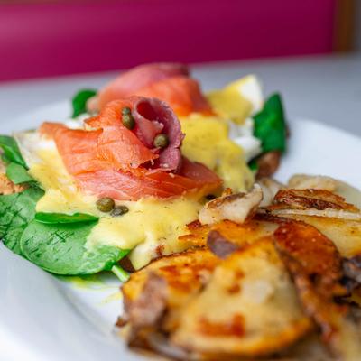 Smoked Salmon Benedict with spinach and capers.