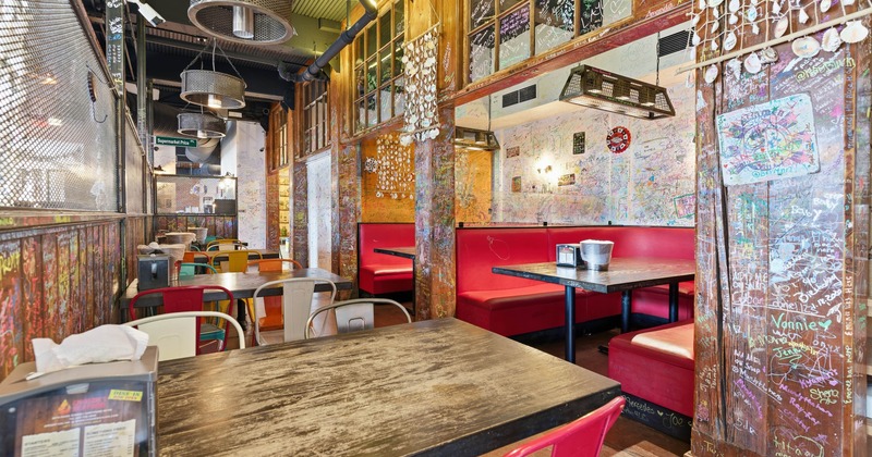 Interior, tables and chairs in dining area