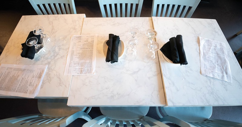 Interior, guest tables and chairs ready for guests