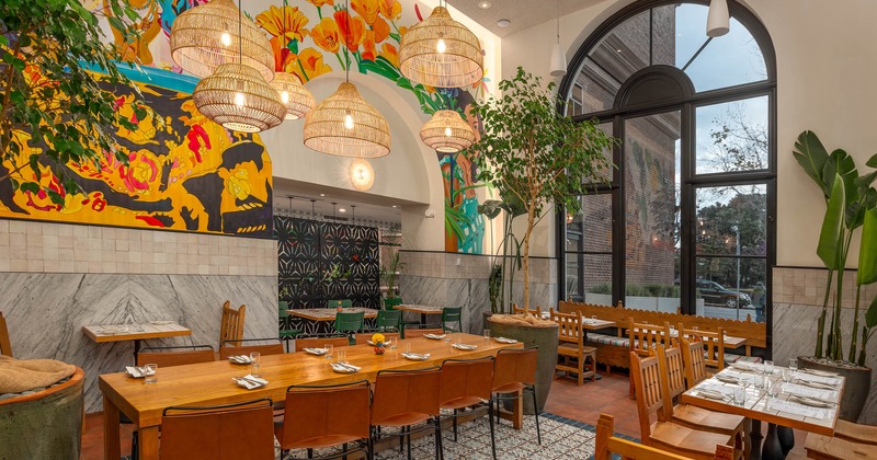 Interior, long tables and chairs, wall art decoration