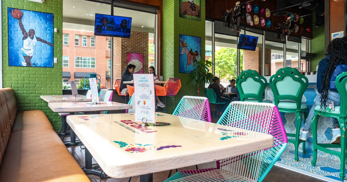Interior, dining area with colorful chairs