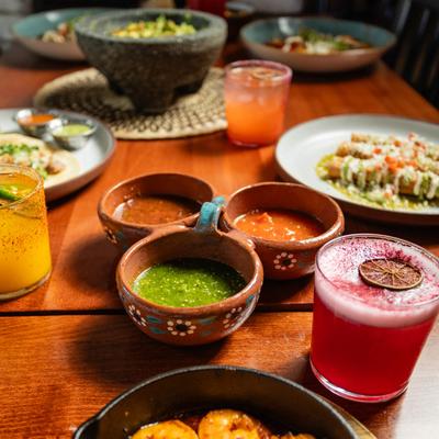 Various foods and drinks on the table.