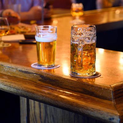 A glass and stein of beer.