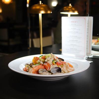 Zucchini pasta with clams, shrimp, and crab meat.