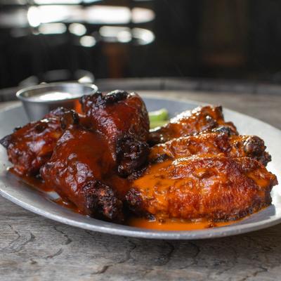 Chicken wings, served.