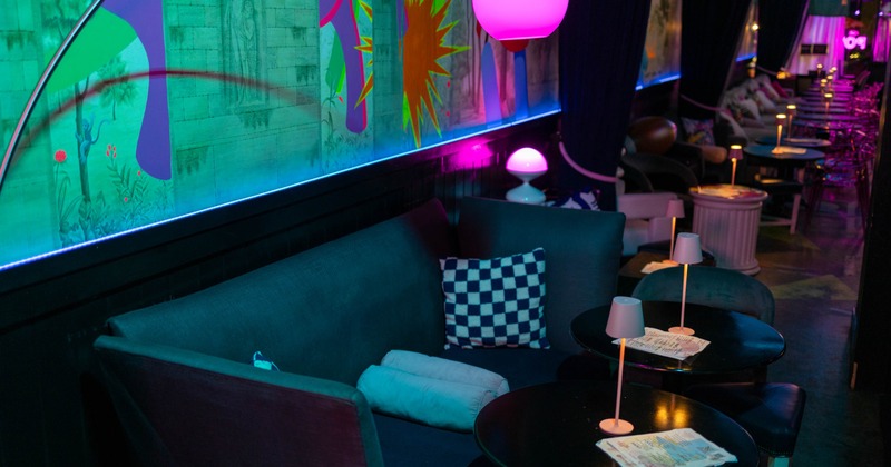 Interior, lounge area, two seater sofa with two coffee tables