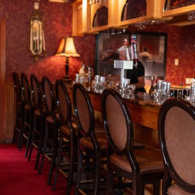 The bar counter and stools.